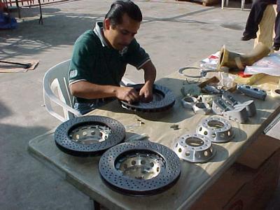 Armando instaling the hats on the rotors