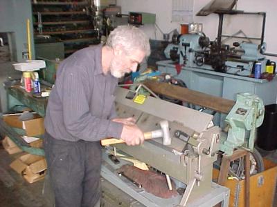 Harro fabricating the holding bracket for the catch tank