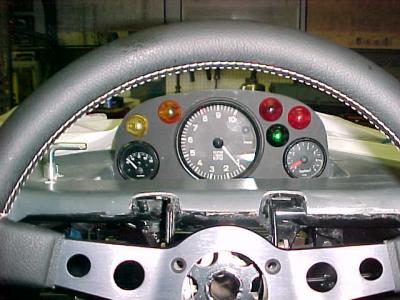 View of the dash hru the steering wheel