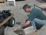 Kent grinding the seat base shell getting it ready to fiberglass in