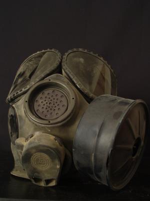 This is my GAS Mask. I just got all my stuff back from Iraq. It's almost been a year since my accident. It still has Iraq dust all over it. I remember when the War first started, and we were in An Najaf. A SCUD alarm went off and we had to put on all of our protective gear. It was so hot, the sweat from my forhead was dripping into my eye's. It was stinging so bad that i thought i had been exposed to a nerve or blister agent. Thank GOD it was only sweat.
