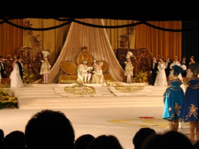 Rex and the Queen of Carnival read invitation.JPG