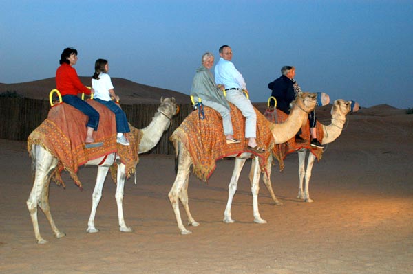 Short camel rides are given at the tented camp