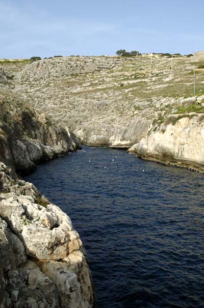 The Blue Grotto is unreachable along the coast due to this inlet and the steep gully beyond it