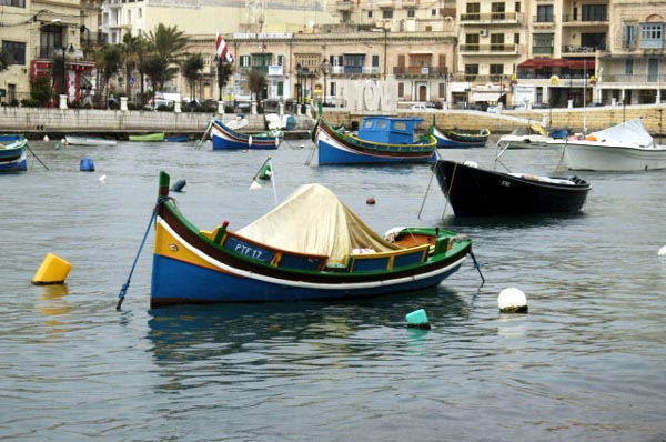 Pretty painted fishing boats, Spinola Bay