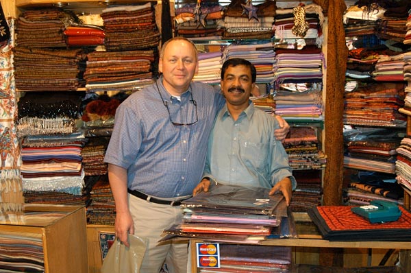 Dru and the Pashima shawl vendor, Souq al Arsah