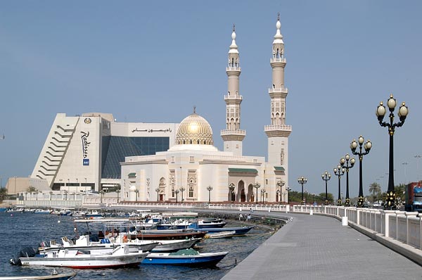 Along Sharjah Creek, mosque and Radisson SAS Hotel