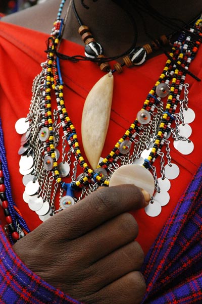 Maasai jewelry often includes a lion's tooth