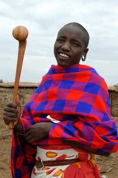 Maasai men carry a club as defence