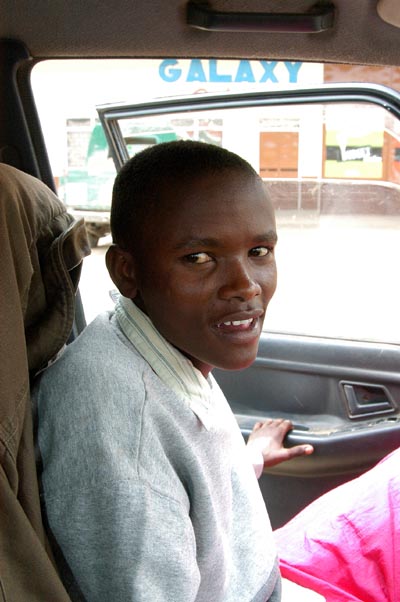 This 19 y.o. from the village changed into regular clothes for a ride to Narok