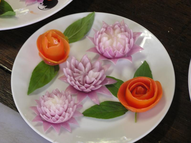 Lotus flowers of onion and roses of tomato peel (m not so good at this)