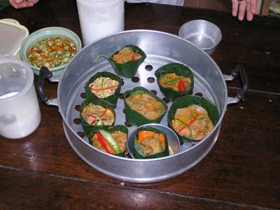 Fish soufle in banana leaf (D's is the one in the lifeboat cuz it sprung a leak)