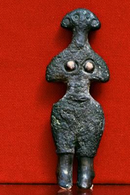 Stylized female statuette