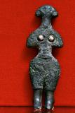 Stylized female statuette