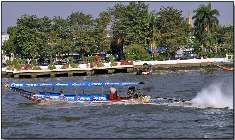 Long-tail boat on the Chao Phraya River near Bangkok
