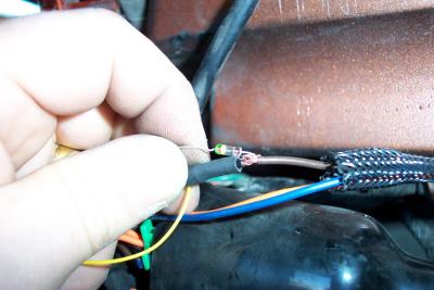 The other end of your new wire needs to be attached to a diode, and then connected to the brown wire in the alarm harness