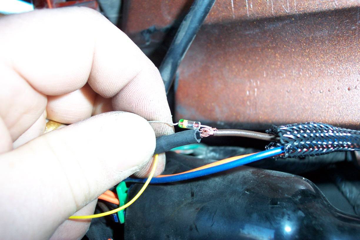 The other end of your new wire needs to be attached to a diode, and then connected to the brown wire in the alarm harness