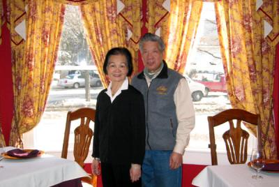 There are several unique, intimate dining areas at Belgique.  This one by the bay window is our favorite.