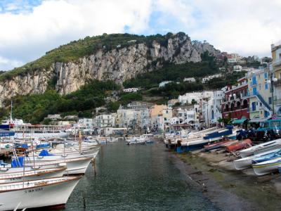 docked boats and landscape looming at Capri.JPG
