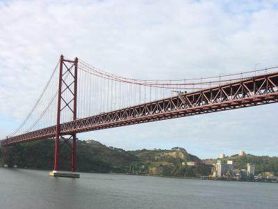 The 25th Avril Bridge in Lisbon. Familiar? It was built by the same firm that did the Golden Gate Bridge.