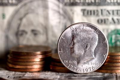 Not a Dime
Yes, it looks like a dime, but it is a Bicentennial 50 cent piece!  The stacks are dollar coins, not pennies...