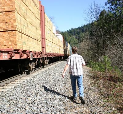We saw 3 trains while we were there.  This train was moving as Larry walked by. 2004