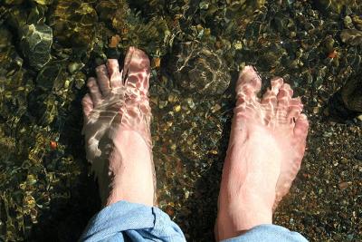 Everytime we go to a body of water I have to take my shoes of and dip my feet, then I take a picture.  I know strange :-) 2004