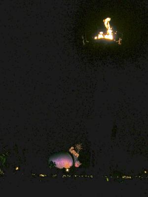 Spaceship Earth and flame at night