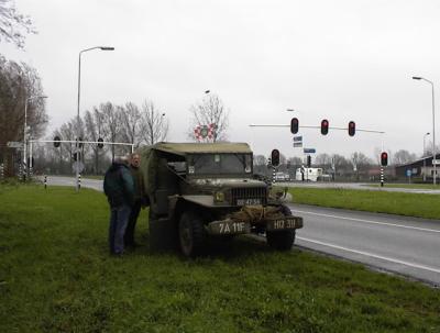 Discussing what  to do with the lame Dodge, driving on was not possible