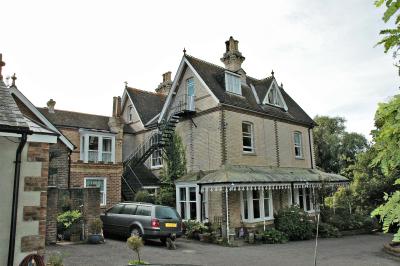 the back of the side of the front of the main house
