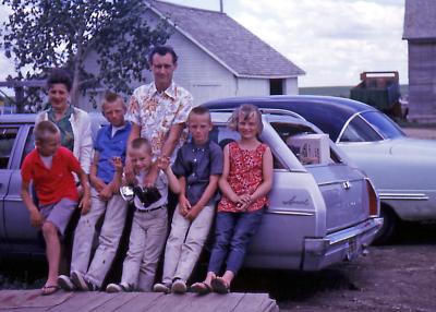 Anne, Donovan, Bill, Bud, Pat, Tim, and Joanne at farm; Diana, Sask. 1964
