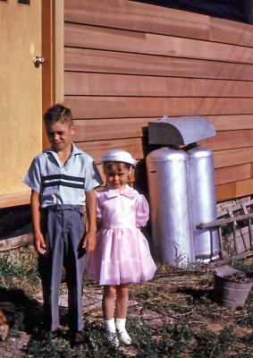 Chris and Lorraine at farm; Diana, Sask., 1964