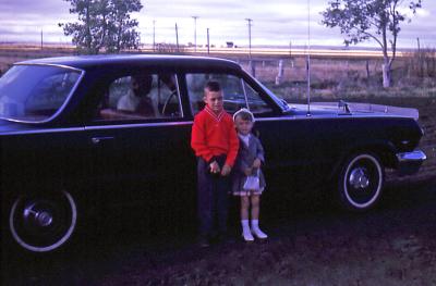 Chris and Lorraine (Paul) going to church; Diana, Sask., 1965