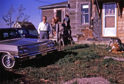Bob, Gladys and Lorraine, Chris, and Rex at farm; Diana, Sask., 1964