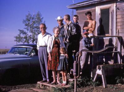 Bob, Gladys, Lorraine, Steve, Kevin, Terry, Greg, and Chris at farm; Diana, Sask., 1964