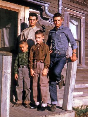 Greg, Steve, Chris, and Mike at farm; Diana, Sask; 1960