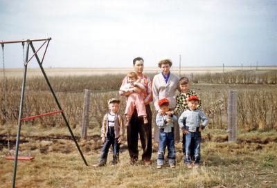 Carl and Terry, Lorraine, Murray, Kevin, Steve, and Greg at Fred and Hattie's; Wilcox, Sask., 1952