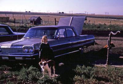 Lorraine, Cocoa, and Rex at farm; Diana, Sask., 1964