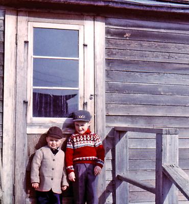 Chris and Mike at farm; Diana, Sask., 1958