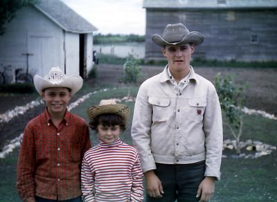 Chris, Lorraine, and Mike at farm; Diana, Sask., 1968