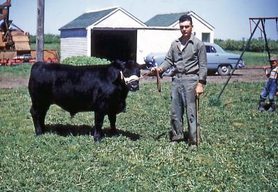 Paul at Fred and Hattie's farm; Wilcox, Sask., 1953