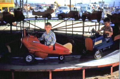 Steve and Greg at amusement park; Inglewood, Calif., 1951
