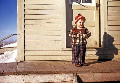 Terry at Fred and Hattie's farm; Wilcox, Sask., 1953