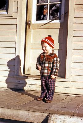 Terry at Fred and Hattie's farm; Wilcox, Sask., 1953