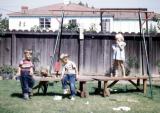 Greg, Steve, and neighbour girl; Inglewood, Calif., 1952