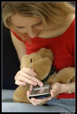 pda user with teddy bear