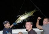 hoby and ronnie and mike landing 60lb tarpon from above 08-29-04.jpg