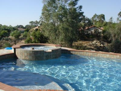 The pool that my son built...he did all the tile brick  and stone work on and around it...