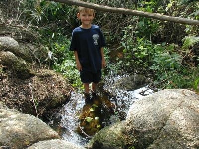 Brandon lost his balance and one foot went in the water...he looked at me and put the other foot in, too....