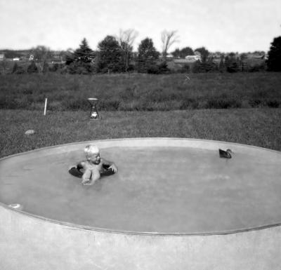 shane-in-pool-with-duck.jpg